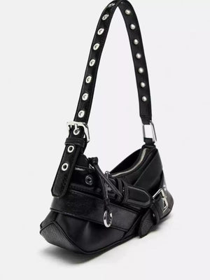 Black shoulder bag with buckle and grommet details