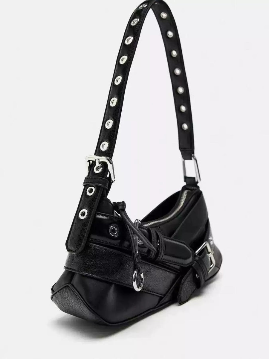 Black shoulder bag with buckle and grommet details