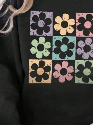 Black sweatshirt with retro floral square print in pastel colors.
