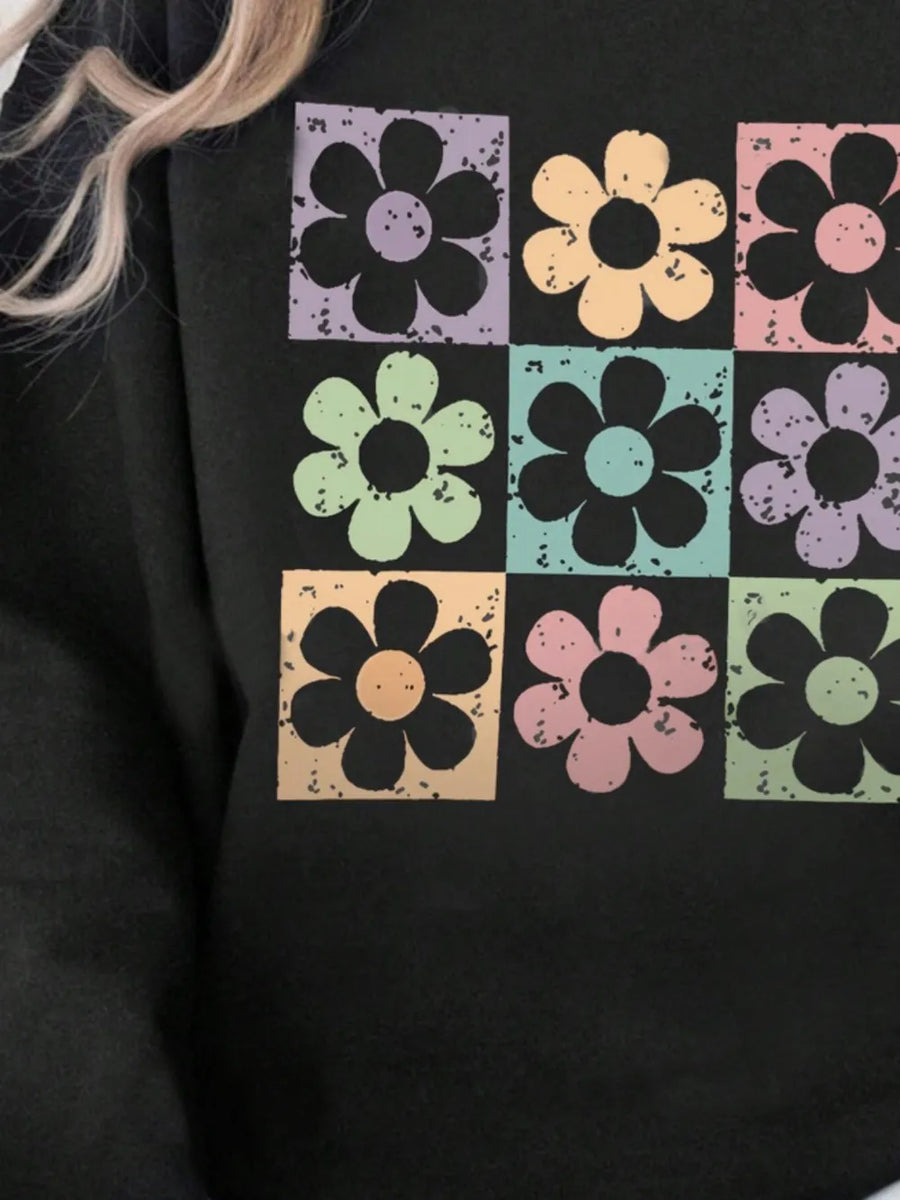 Black sweatshirt with retro floral square print in pastel colors.
