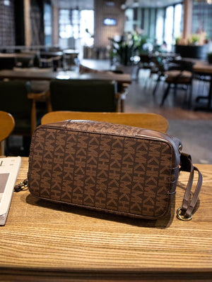 crossbody bag featuring monogram in dark brown with PU Leather Imported Size &amp texture