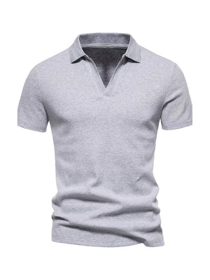 Men's light gray cotton blend polo shirt with notched collar and short sleeves.