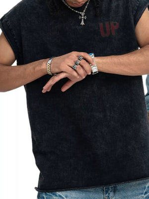 Black acid-wash graphic tank top with distressed details and raw hem