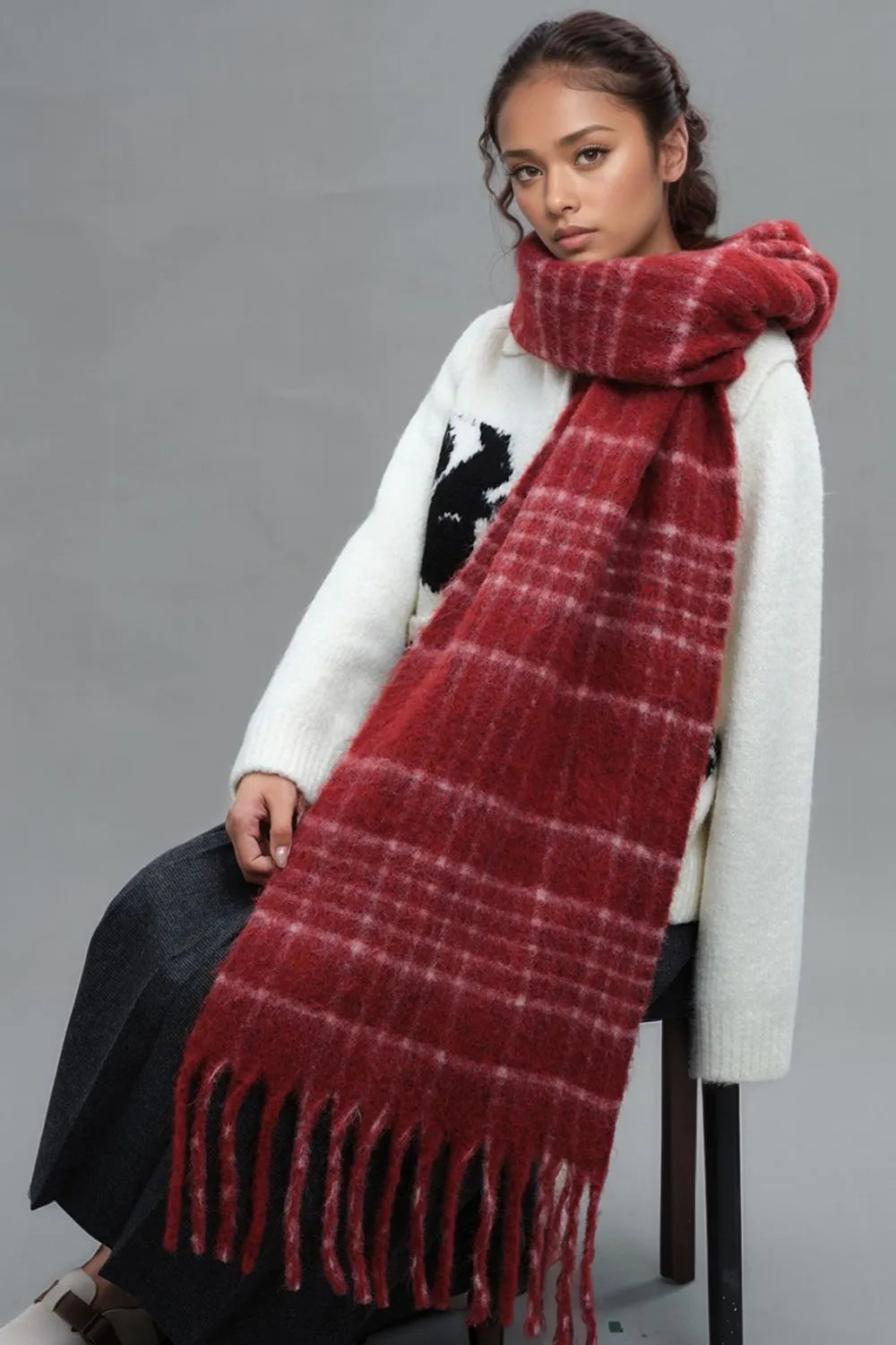 Deep Red plaid fringed winter scarf with a textured, fuzzy finish.