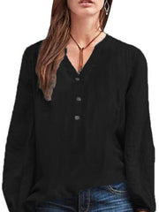 Black long-sleeve blouse with notched neckline and button detail