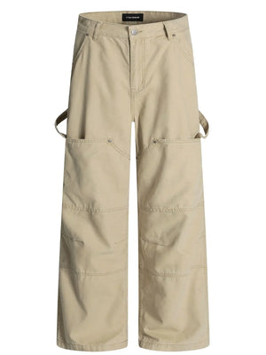 Khaki wide-leg cargo trousers with large front pockets and strap details.