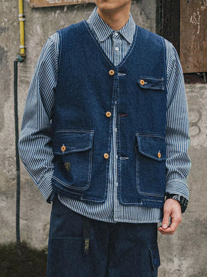 Navy denim vest with V-neck, button-up front, and four pockets.