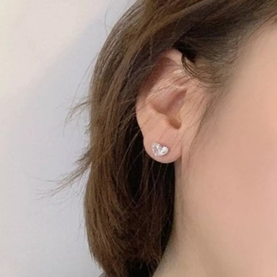 clear earrings featuring heart-shaped and heart