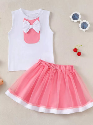 White cotton baby tank top with pink pocket and bow, paired with a pink tulle skirt.