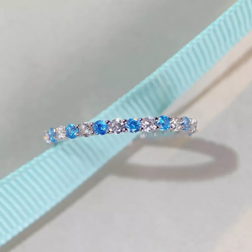 925 sterling silver,Zircon Care instructions: Avoid wearing during exercise, as ring in Light Blue with band silhouette
