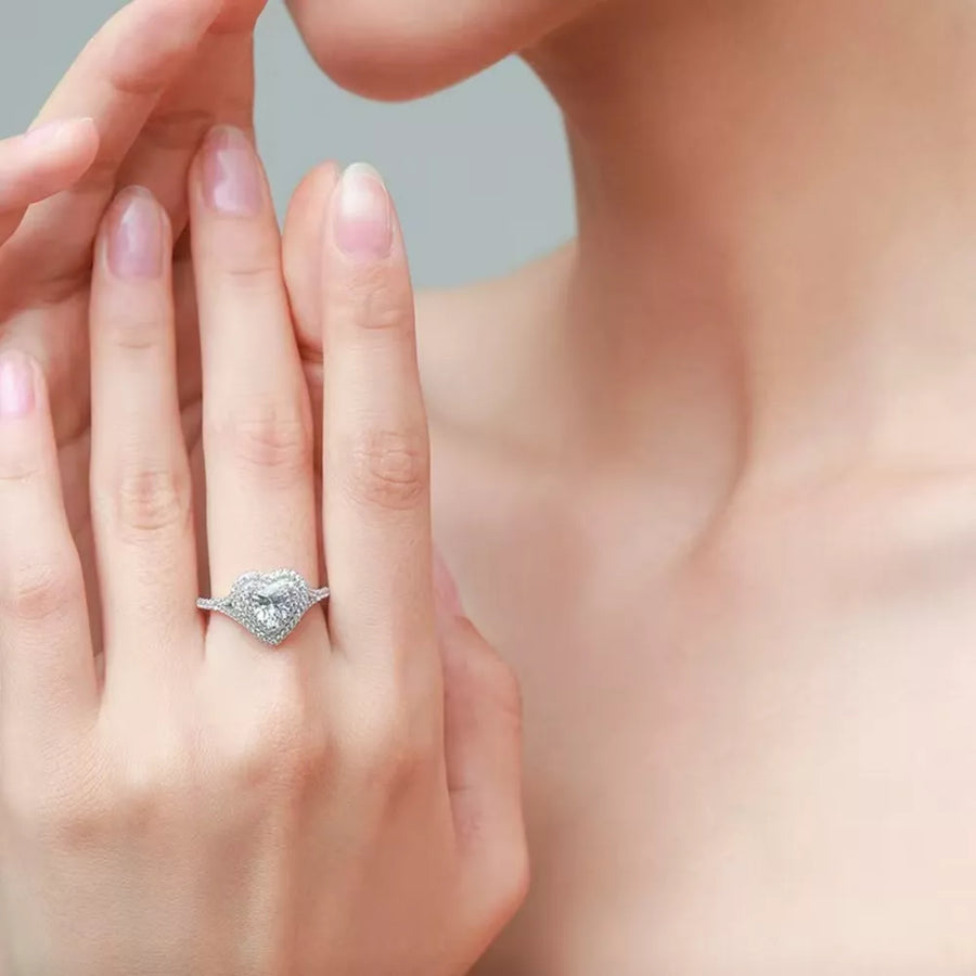 Brilliant Heart Moissanite Ring With Halo on a woman's hand