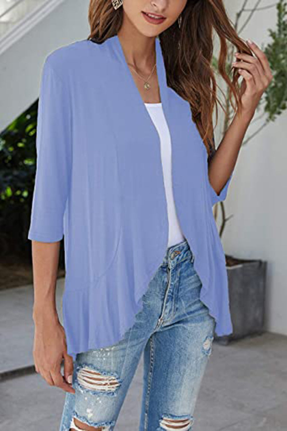 Light blue waterfall cardigan with asymmetric hemline and 3/4 sleeves.