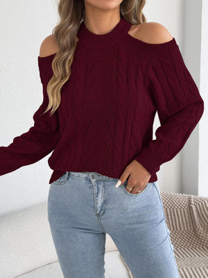 pullover sweater in orange with cable knit and cable-knit