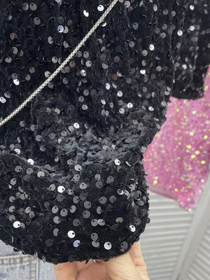 Black iridescent sequin embellished t-shirt with crew neck and short sleeves.