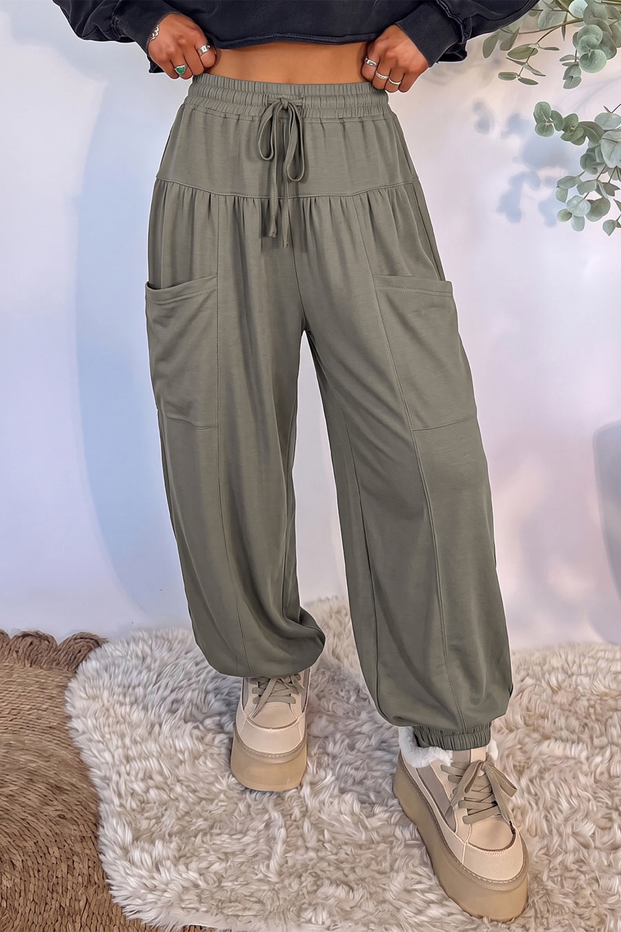 75% polyester, 20% cotton, 5% elastane Care instructions: Machine wash cold wide-leg pants in sage green with wide-leg