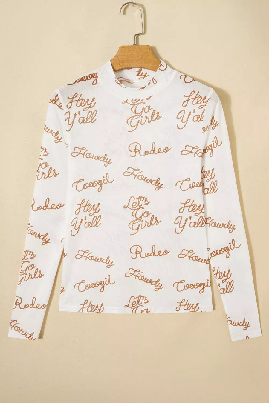 White sheer long sleeve shirt with all-over brown text print and high neckline.