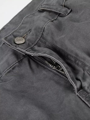 Men's relaxed fit cotton cargo capris in charcoal gray with button and zipper closure.