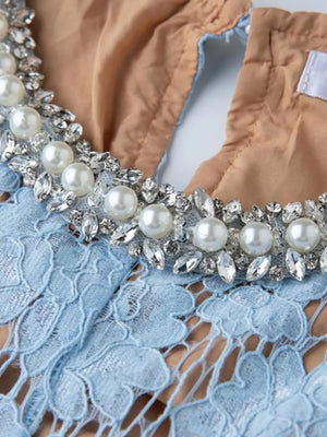 Blue lace dress with pearl and crystal embellished neckline detail
