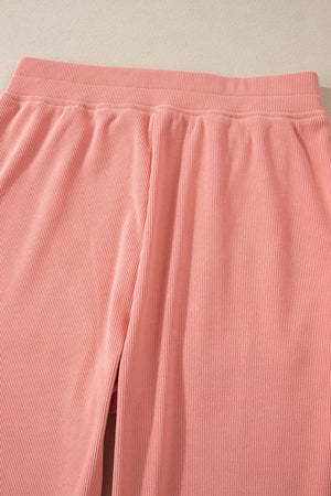 Pink ribbed wide leg pants with elastic waistband
