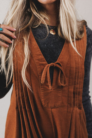 rust romper with pocketed and sleeveless