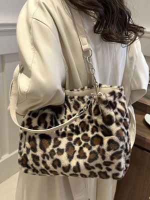 Leopard print faux fur shopper bag with chain handle and cream straps.