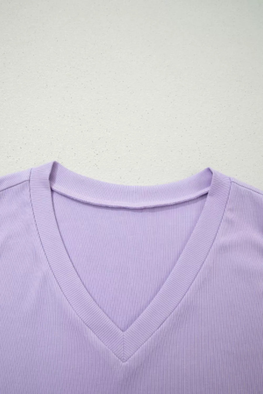 Lavender ribbed V-neck bodice detail of a maxi dress