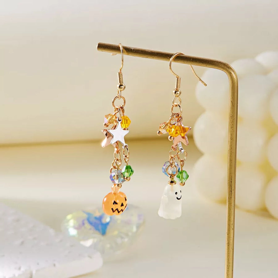 earrings in gold with novelty and asymmetrical