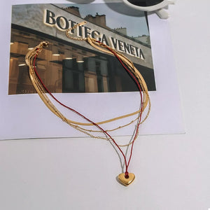 gold necklace with collarbone length and clasp