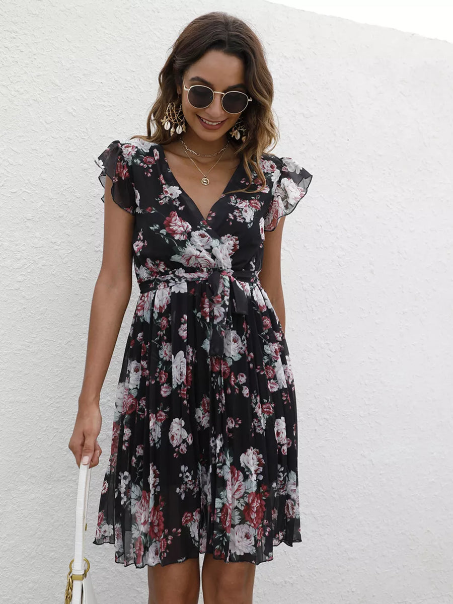 Black floral pleated dress with ruffle sleeves and belted waist