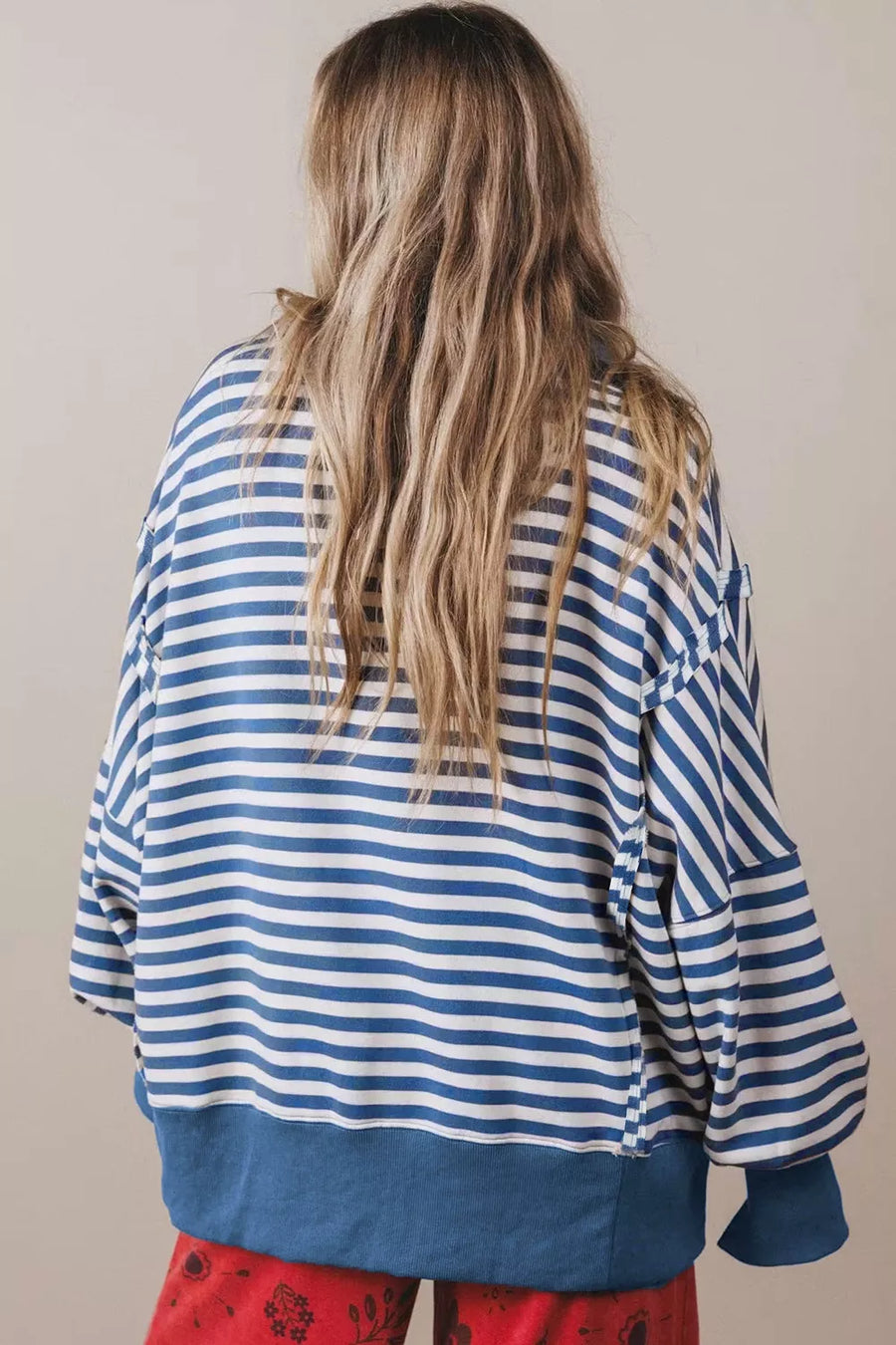 white sweatshirt with hip-length and half-button