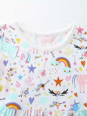 Toddler unicorn dress with rainbow, clouds, and stars print on white cotton.