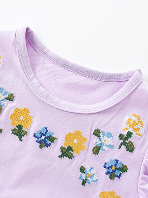 Lavender toddler dress with floral embroidery and crew neck.