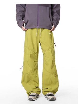 Relaxed fit cargo pants in Mustard Yellow with drawstring and contrast stitching.
