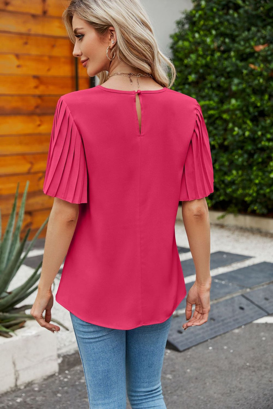 Deep Rose blouse with pleated short sleeves and keyhole back detail.