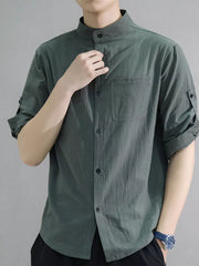 Army green cotton button-down shirt with roll-up sleeves and chest pocket