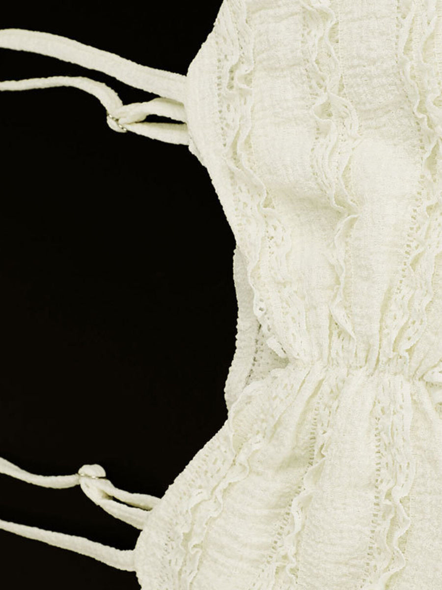 White textured sweetheart neck cami top with lace trim and tie straps.