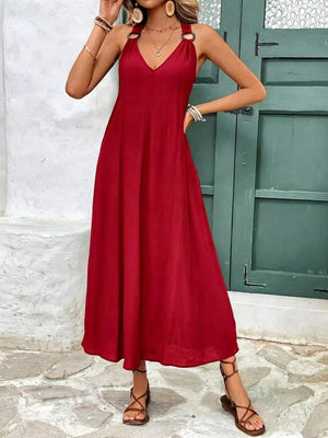 Red halter-detail midi dress with V-neck and ring accents, a-line cut.