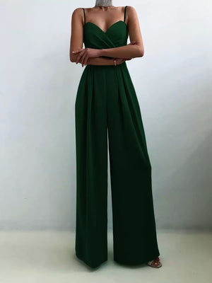 Dark green ruched spaghetti strap wide-leg jumpsuit with sweetheart neckline and high waist.