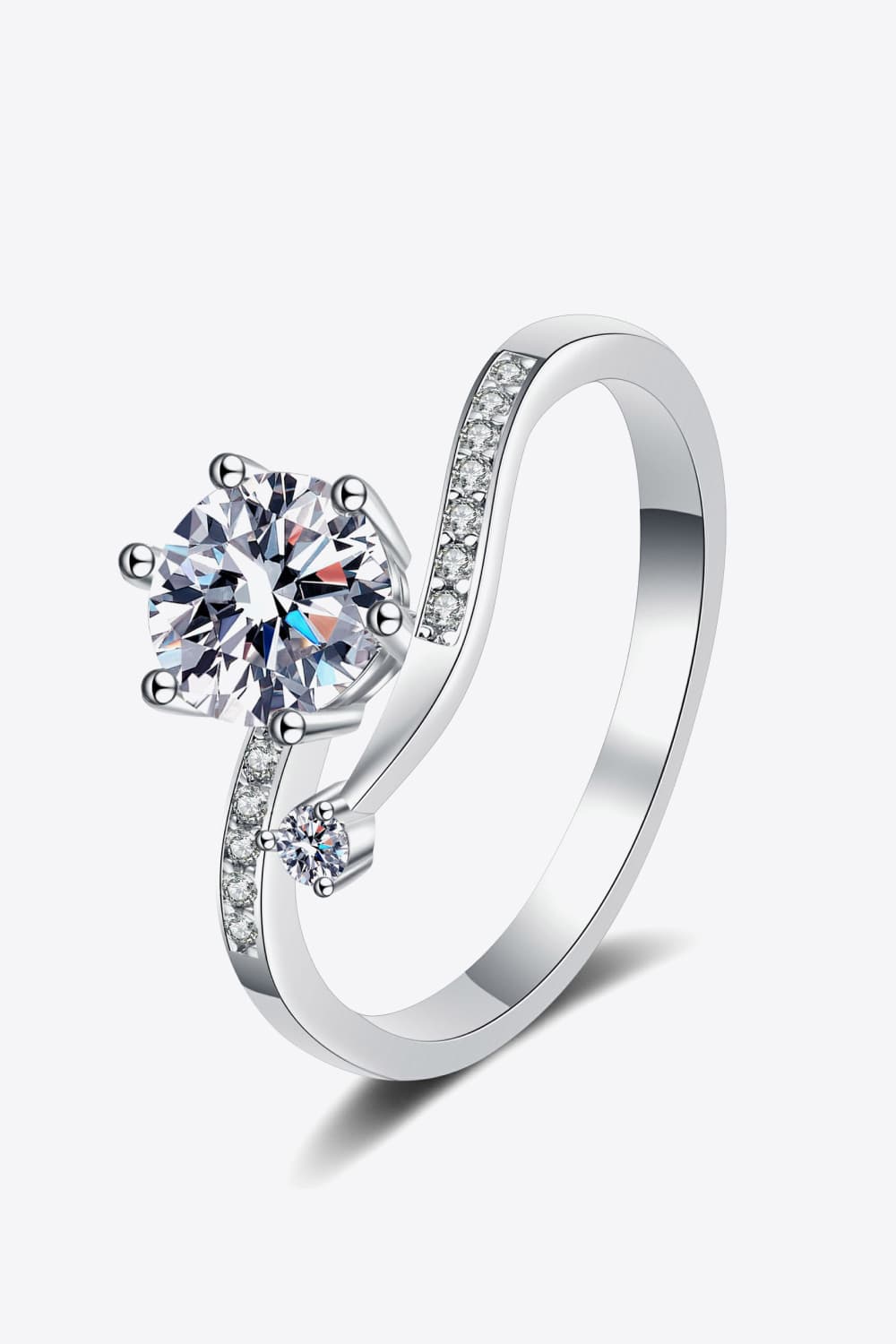 Silver bypass ring with moissanite and pavé diamond accents