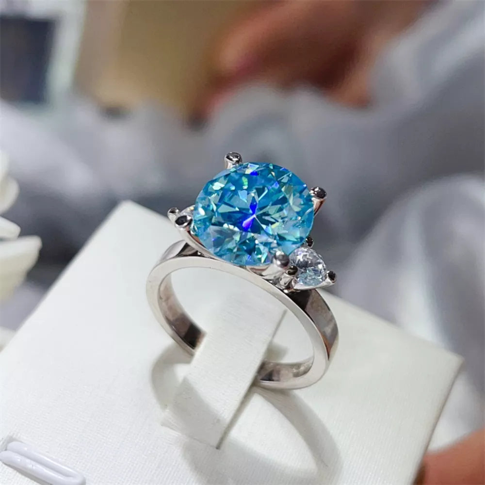 ring in aqua blue featuring 5 carat moissanite and straight fit