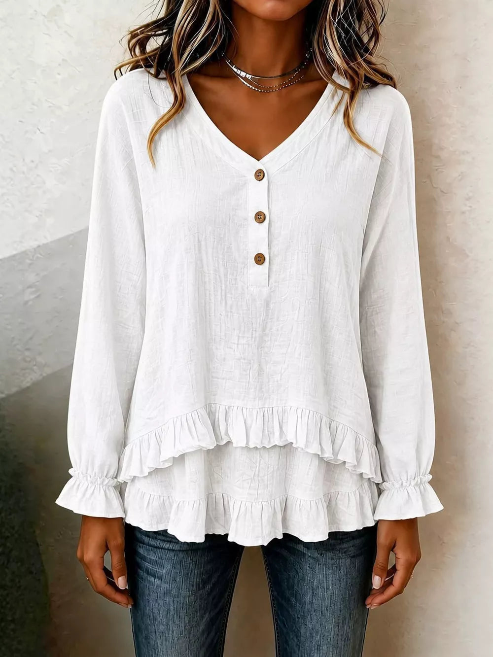 blush pink blouse with hip-length and half-button