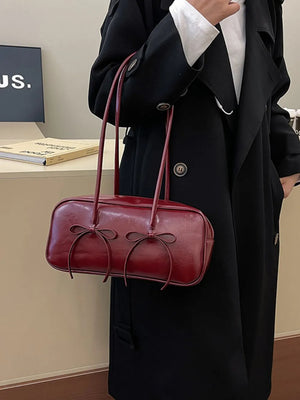 Burgundy patent leather shoulder bag with bow details