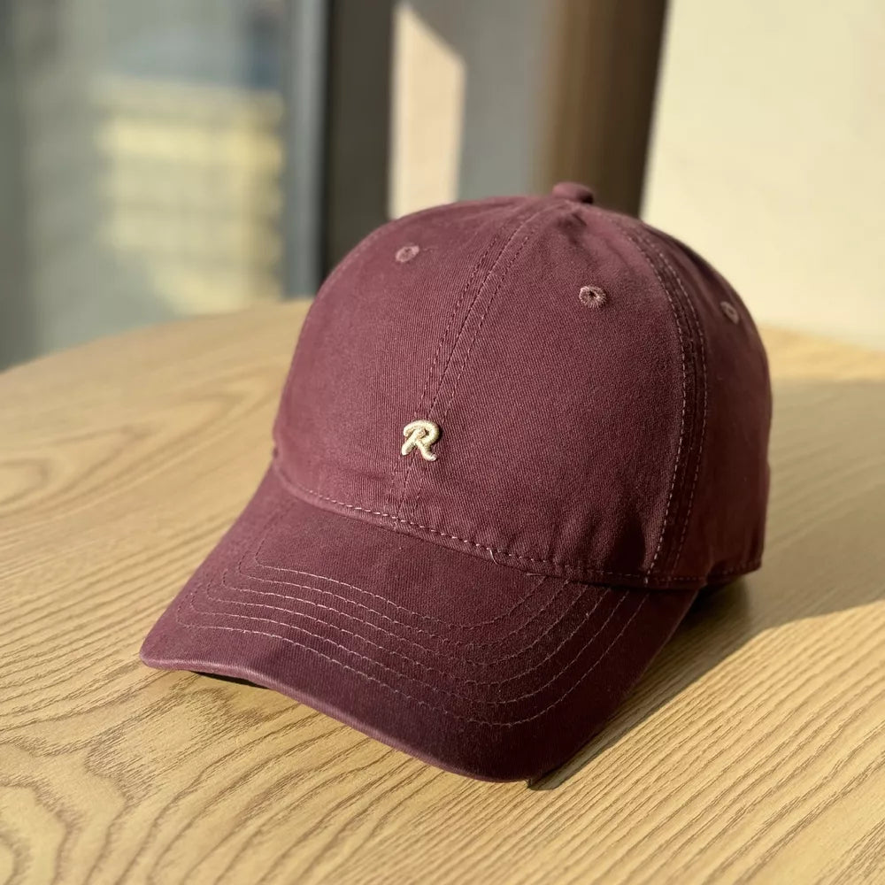 Burgundy baseball cap with embroidered R detail