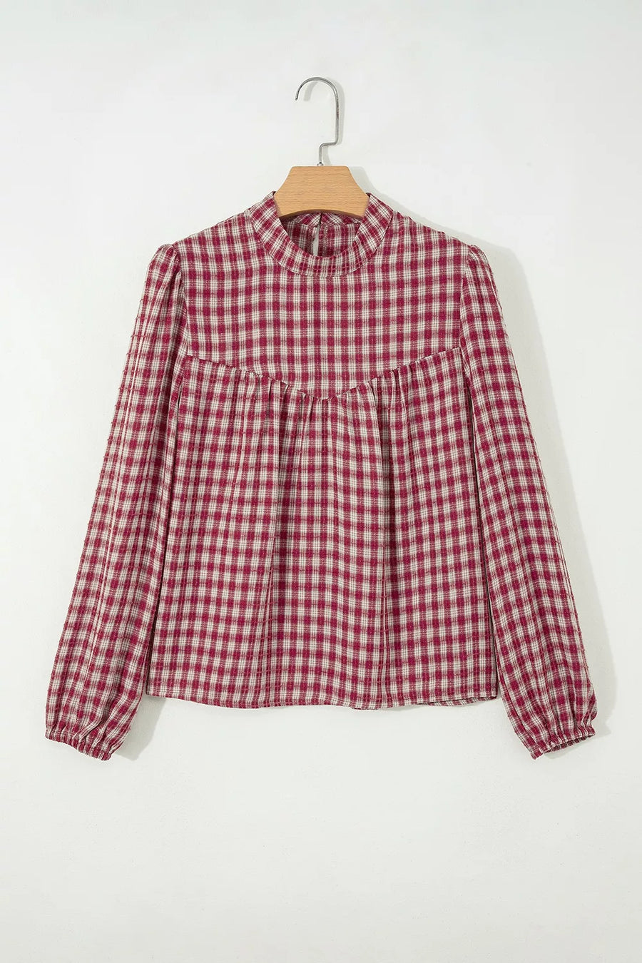 Country plaid long sleeve blouse with mock neck and keyhole detail.