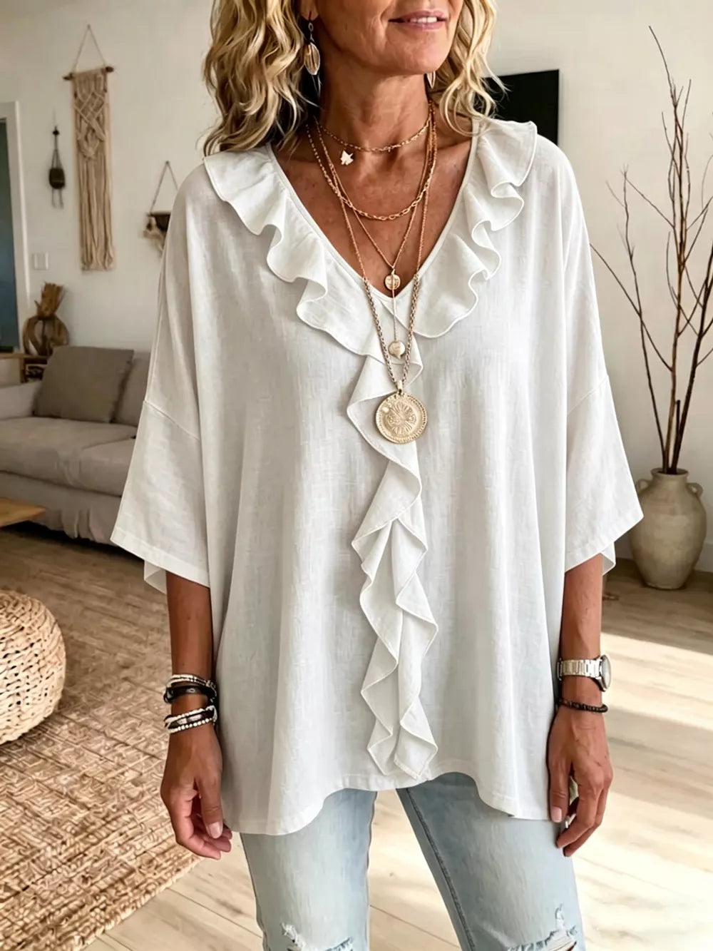 blouse in white featuring frill and relaxed fit