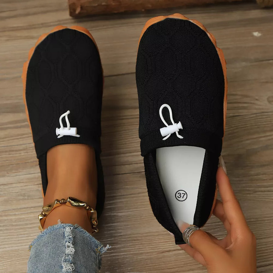 flats in Beige with geometric and round toe