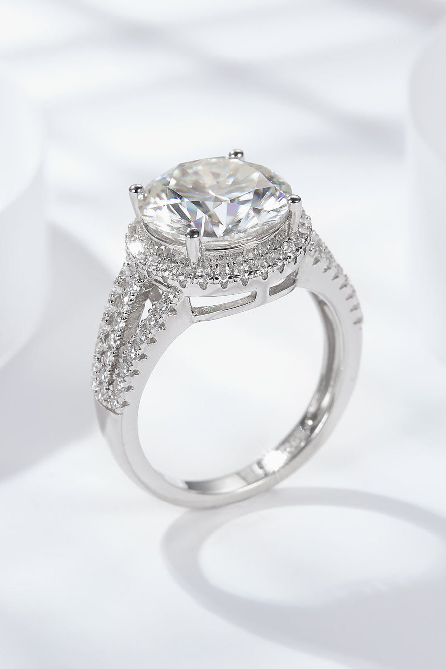 Silver split shank halo engagement ring with pave band