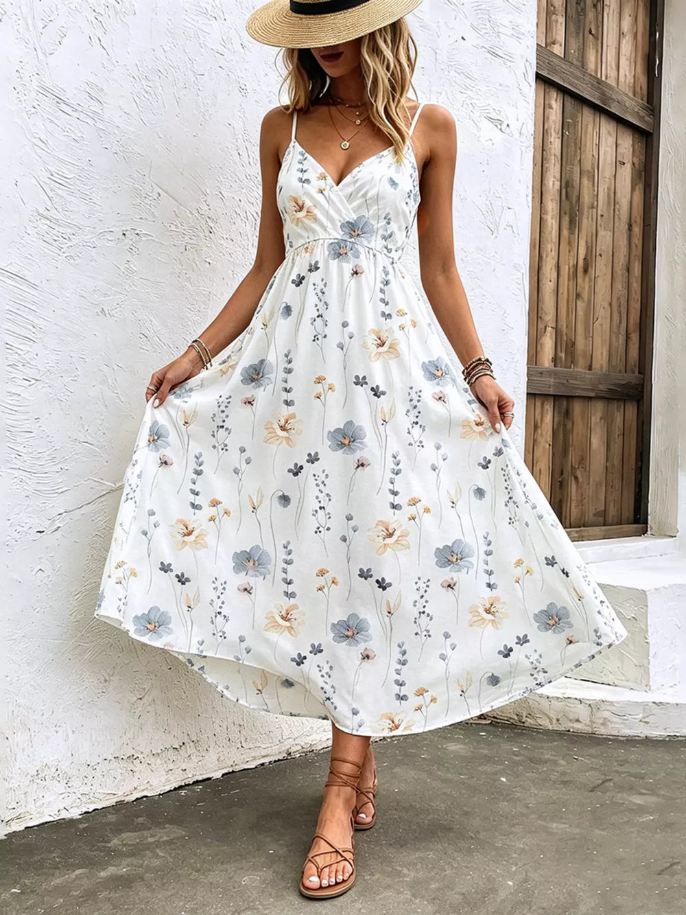 White floral print spaghetti strap midi dress with adjustable straps and a-line cut.