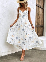 White floral print spaghetti strap midi dress with adjustable straps and a-line cut.