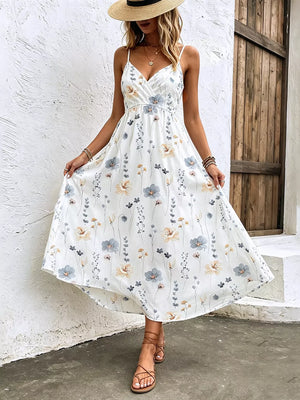 White floral print spaghetti strap midi dress with adjustable straps and a-line cut.